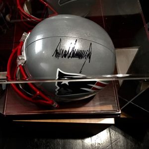 President Donald Trump signed Patriots helmet