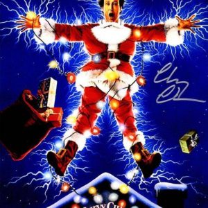 Chevy Chase Christmas Vacation Authentic Authenticated Autographed 11× 17 photo.